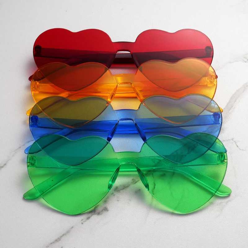 Free delivery 2023 candy colored heart-shaped ocean person frameless childrens sunglasses fashion candy love sunglasses W250109