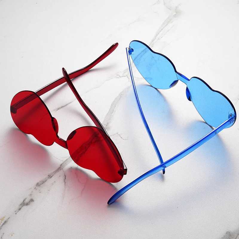 Free delivery 2023 candy colored heart-shaped ocean person frameless childrens sunglasses fashion candy love sunglasses W250109