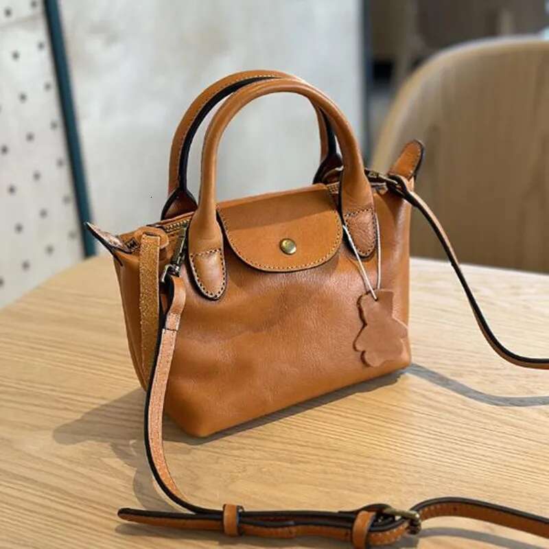 2025 Spring/Summer Vegetable Tanned Cow Leather Women's Hand Bill Shoulder Bag Leather Casual Fashion Mini Crossbody Bag