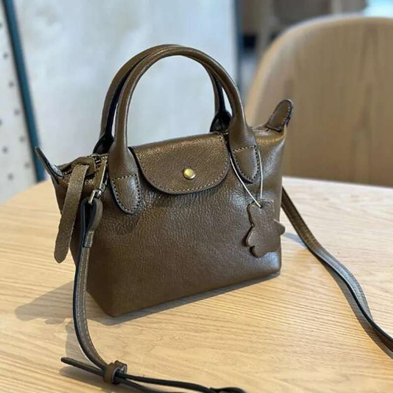 2025 Spring/Summer Vegetable Tanned Cow Leather Women's Hand Bill Shoulder Bag Leather Casual Fashion Mini Crossbody Bag