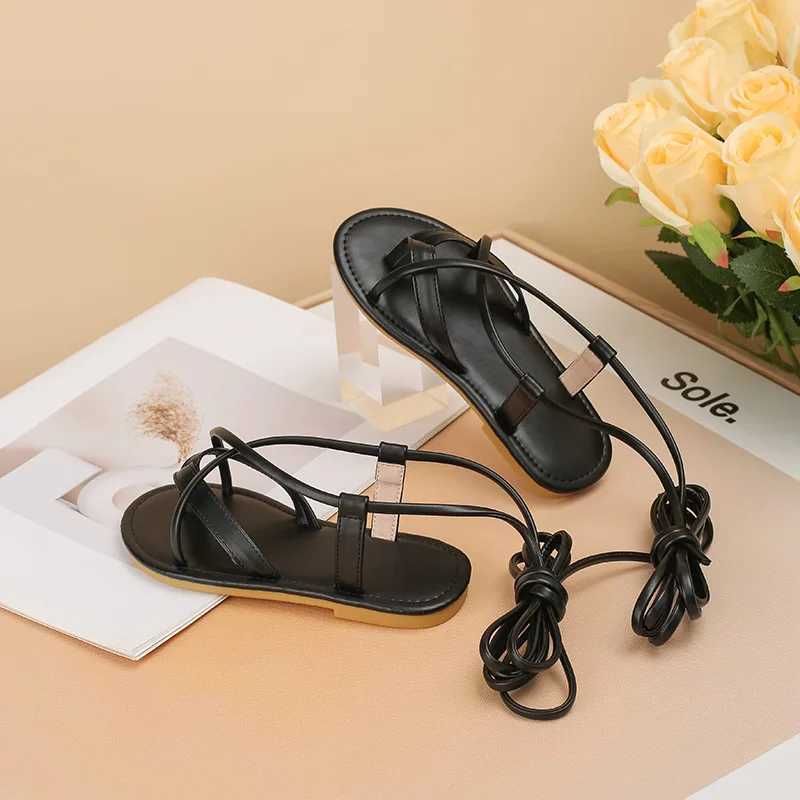 2024 New Womens Shoes Black Cross Belt Roman Sandals Summer Soft Bottom Comfortable Childrens Princess Shoes Flat Shoes Casual Flip Cover W250108