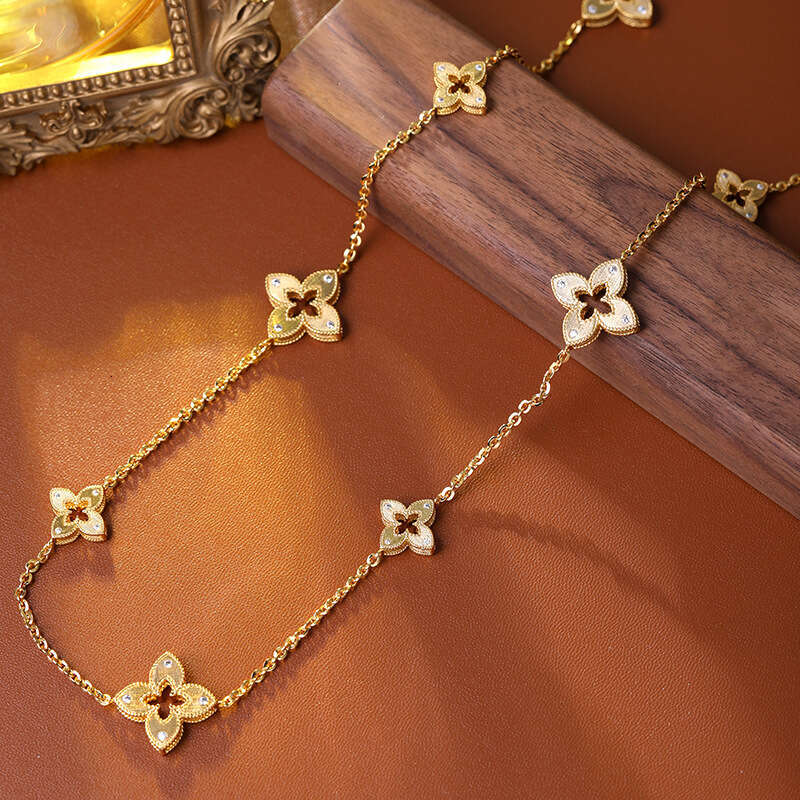 New style designer Drawing process hollowed out lucky clover earring bracelet for women high-end feel light necklace sweater chain earring 4/ Leaf jew