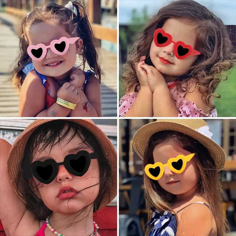 2023 New Childrens Fashion Heart Shaped Dazzling Color Jelly Sunglasses UV400 Outdoor Girls and Boys Protective Sunglasses Childrens Sunglasses W25010
