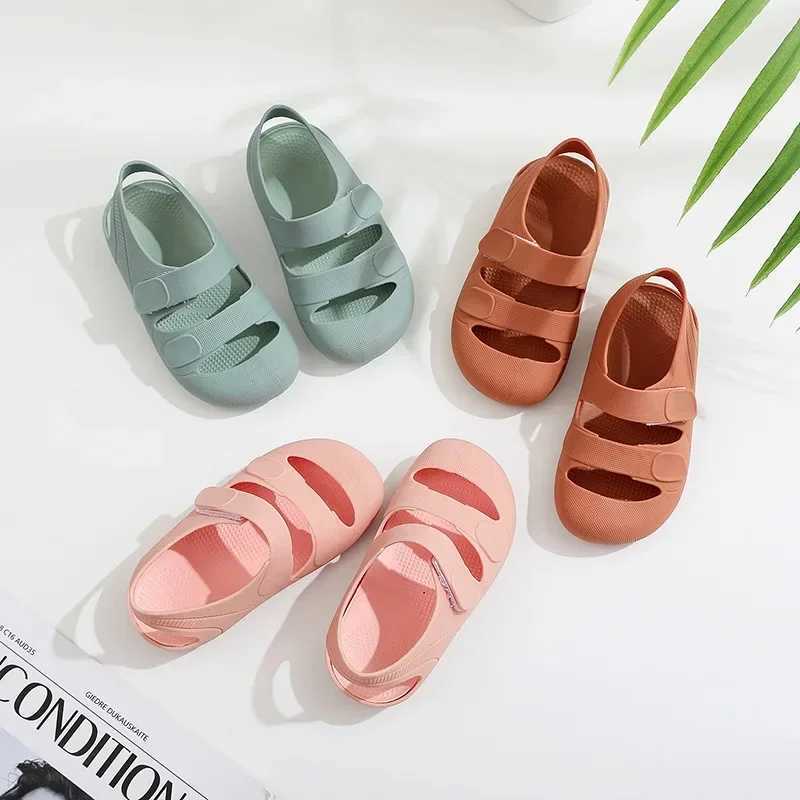 Childrens sandals with hollow closed toes breathable candy colored Roman sandals suitable for boys and girls soft and non slip childrens shoes W250108