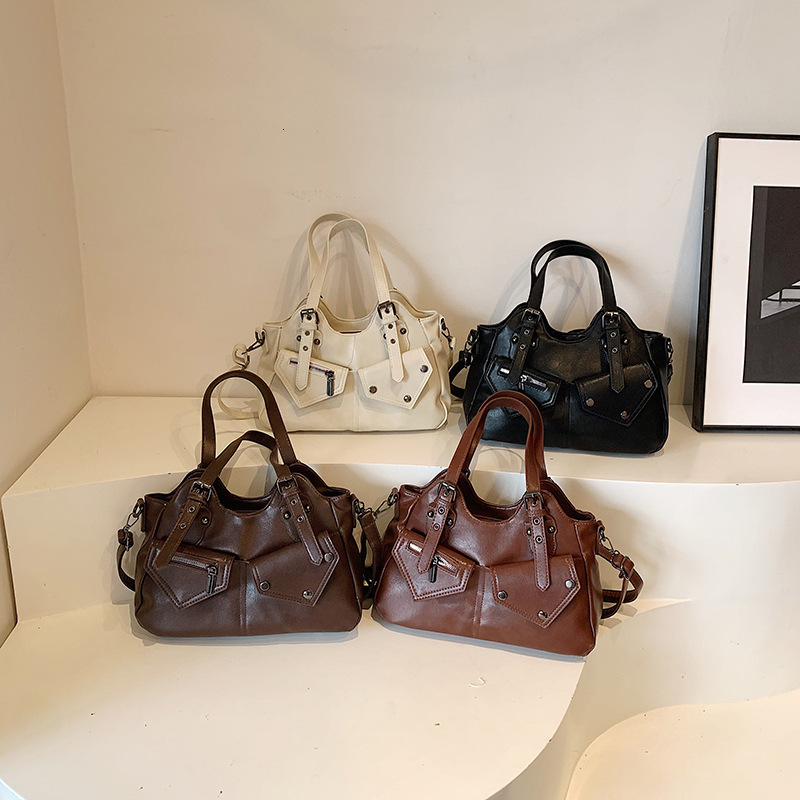 Free Shipping New Designer Rivet Large Capacity Bag Cross Splicing Women's Handbag Outsourcing