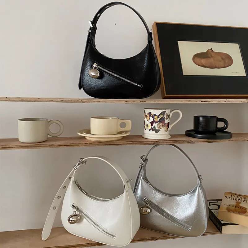 PU Small Ball Crescent Armpit 2024Ins Hot Girl Style Crossbody Saddle Niche Design Sier Texture Shoulder Bag