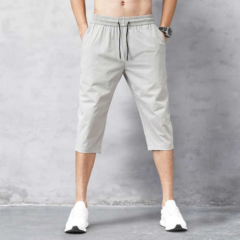 New Arrival Mens Baimu Big Board Quick Drying Beach Black Mens Long Short sleeved Summer Sprint Thin Nylon 3/4 Long Trouser Z250110