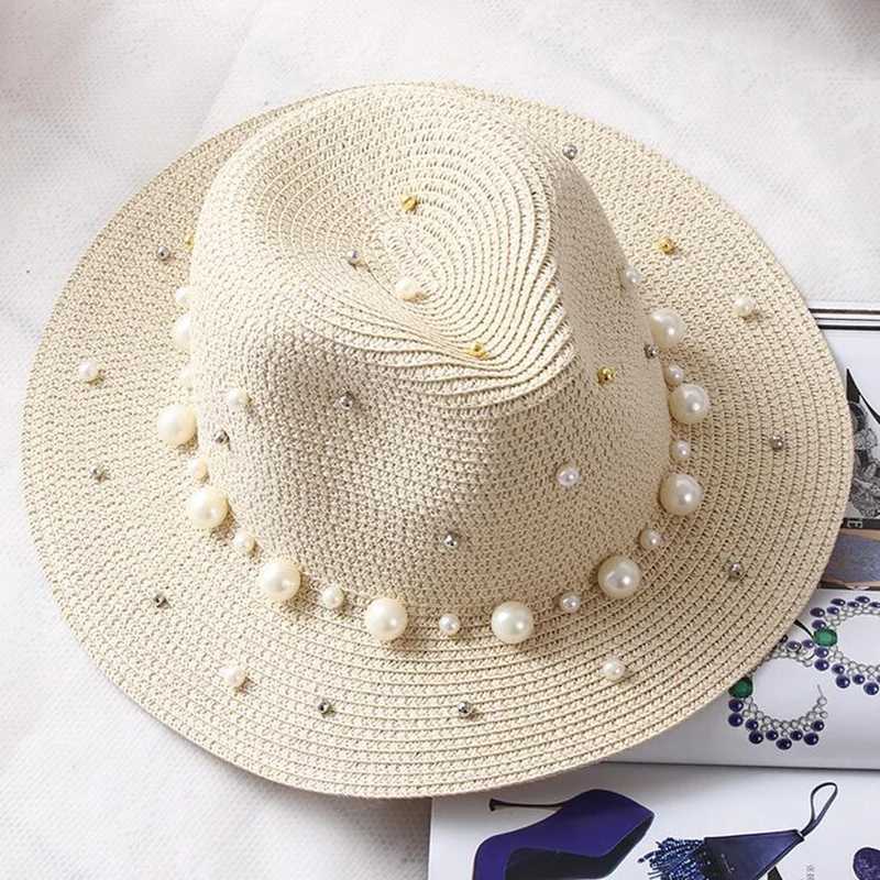 New spring and summer hats for floral beads wide edged jazz Panama hats sun shading beach hats pearl river grass hats X250109