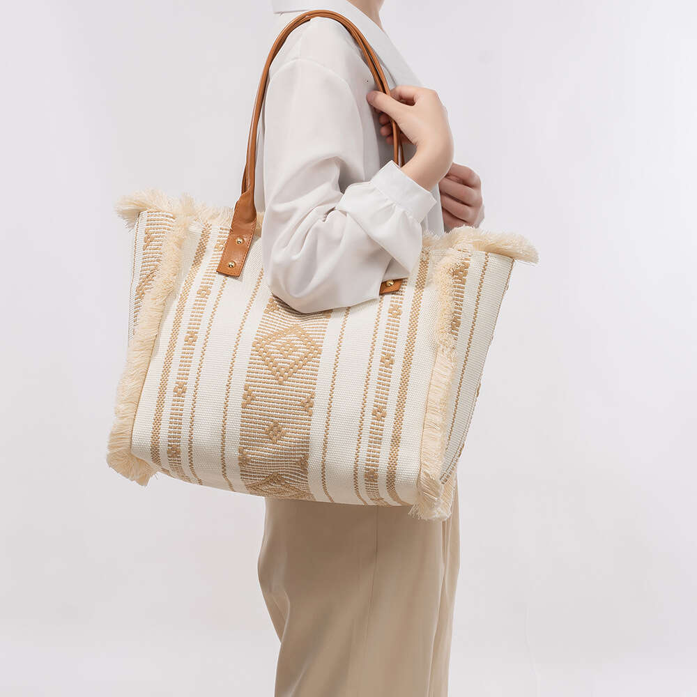 Canvas Large Capacity Women's Tote Bag, Four Sided Tassel Handbag, Niche Design, Ethnic Style Shoulder Bag