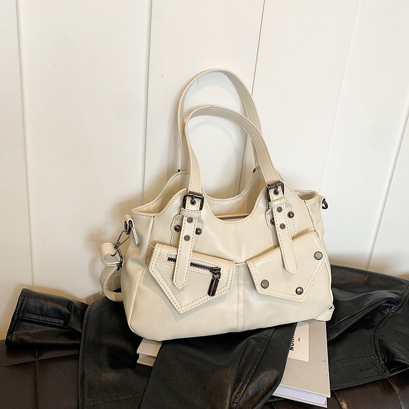 Free Shipping New Designer Rivet Large Capacity Bag Cross Splicing Women's Handbag Outsourcing