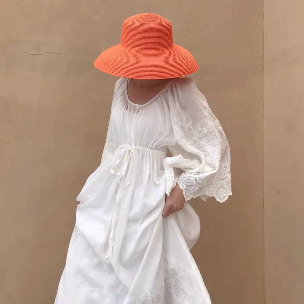 Orange Hat New Wens Sun Hat Folding Beach Hat Big Brim Travel Sunscreen Hepburn Wind Sun Hat Travel Hat X250109