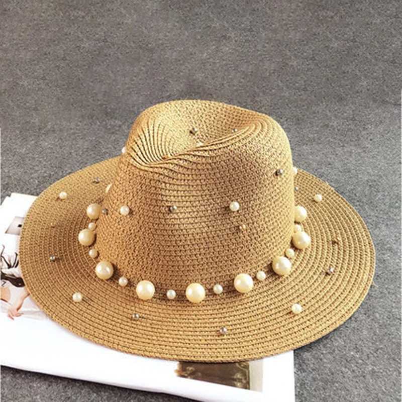 In the new summer of 2019 the UK pearl flat inlaid straw hat sun hat beach hat womens beach hat and sunny fashionable jazz hat X250109