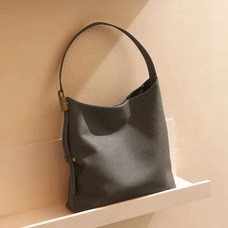 Women's Niche Head Layer Lock Button Stray Genuine Leather Bag Commuter Large Capacity High End Single Shoulder Top-Handle Bags
