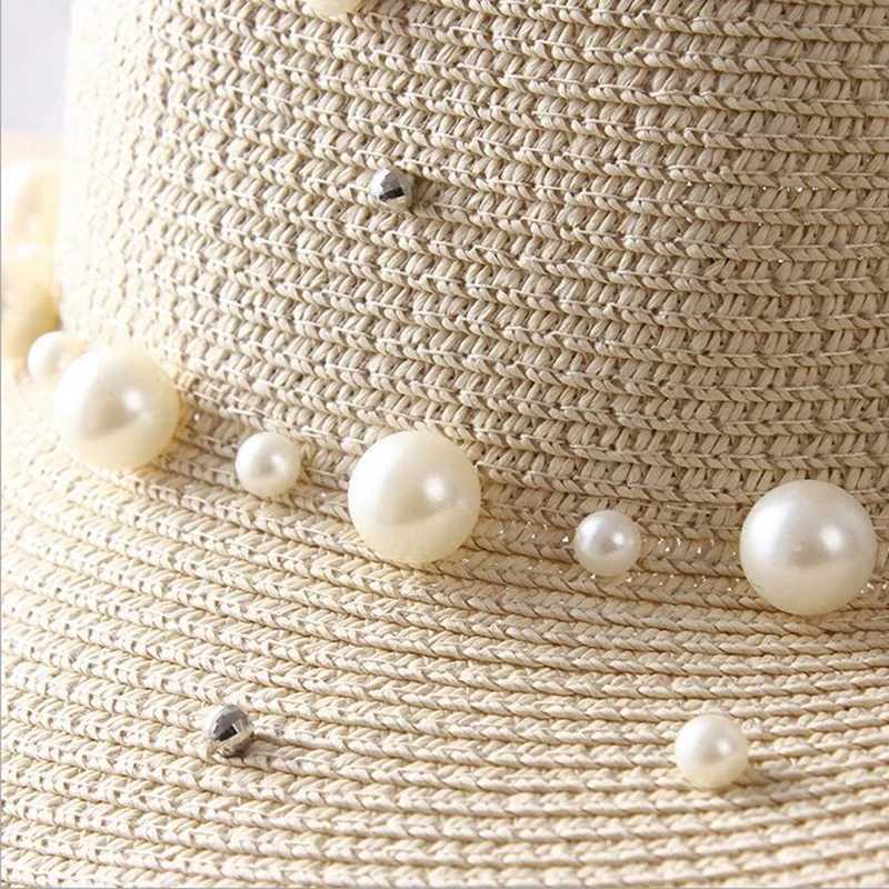 New spring and summer hats for floral beads wide edged jazz Panama hats sun shading beach hats pearl river grass hats X250109
