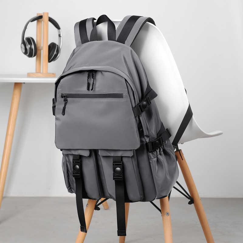 Large capacity backpack, student backpack, middle school student, high school student, college student, trendy brand, fashionable travel bag 250110