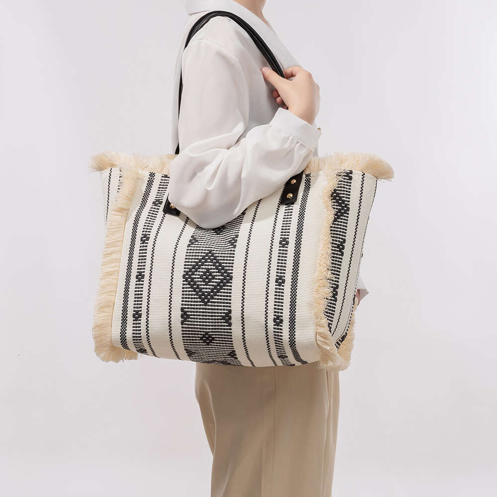 Canvas Large Capacity Women's Tote Bag, Four Sided Tassel Handbag, Niche Design, Ethnic Style Shoulder Bag