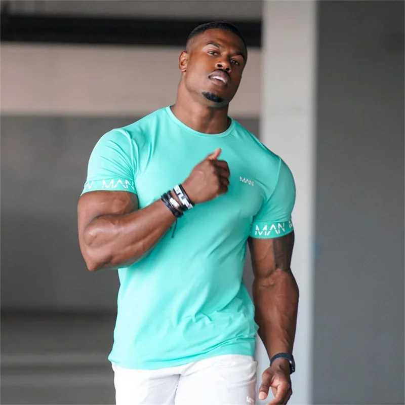 2024 New Summer Mens Short sleeved Quick drying Gym T-shirt Running Fitness Top Street Clothing Sports T-shirt Mens Clothing W250111