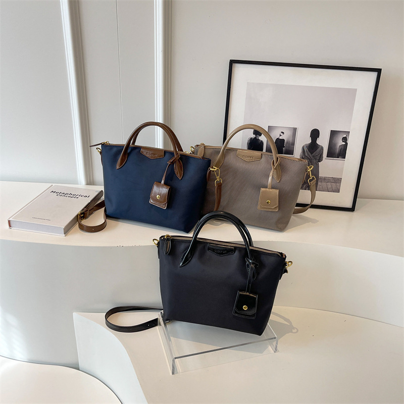 2025 Designer free shipping 2025 3 designer Shoulder Bags for women Solid color casual handbag Mother child package Plain Cartoon Hobos tote black