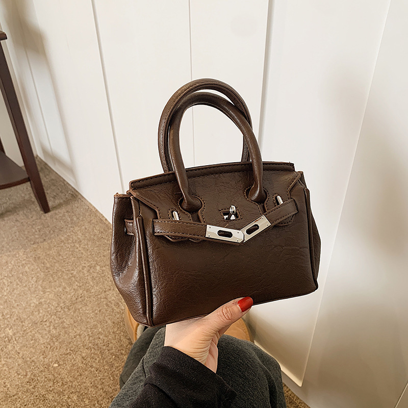 Ladies' Shoulder Bag New Fashion High-end Niche Design Retro Handheld Bag Triple Black Brown Coffee Free shipping