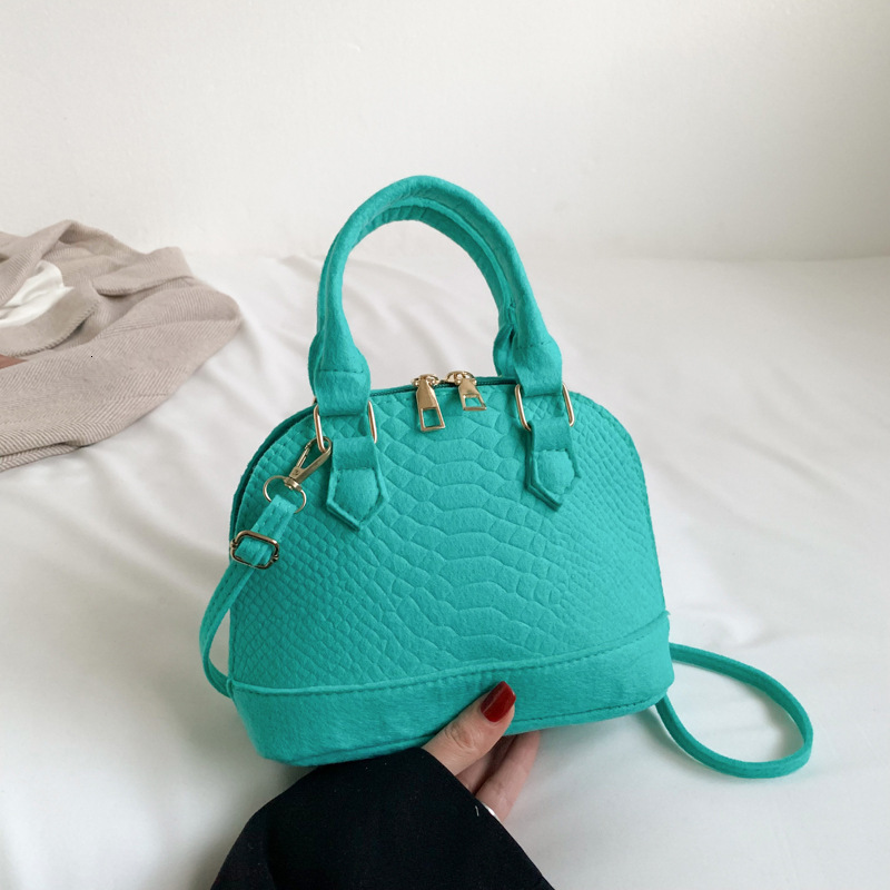 Baobao 2025 Spring New Korean Designer Handbag Fashion Handheld Shell Simple And Casual One Shoulder Crossbody Bag Female