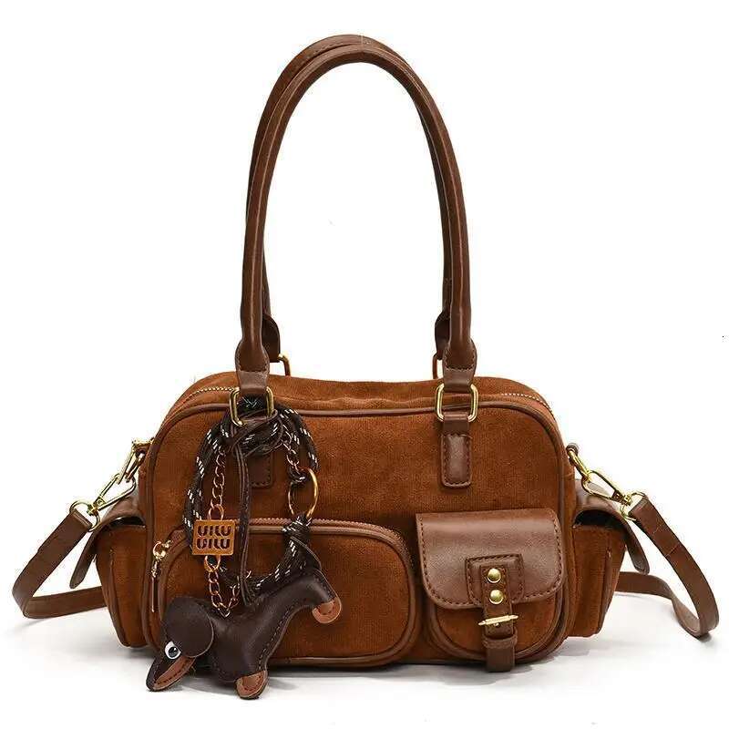 2025 new PU leather and synthetic suede patch designer women's shoulder retro pendant crossbody bag pillow handbag