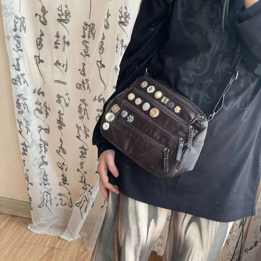 Europe Moda Moto Exquisite Commuter Messenger Bags Vintage All-Match Simple Heavy Button Shoulder Soft Wash Leather Crossbody