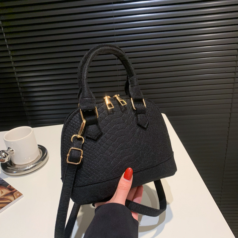 Baobao 2025 Spring New Korean Designer Handbag Fashion Handheld Shell Simple And Casual One Shoulder Crossbody Bag Female