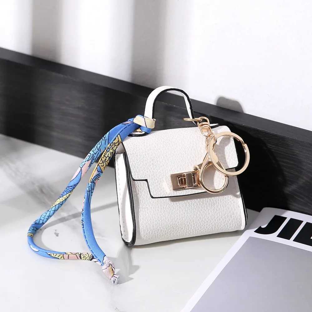 Keychains Lanyards Lipstick pocket mini headset coin purse pendant key ring handbag chain gift H250113