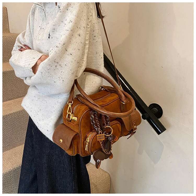2025 new PU leather and synthetic suede patch designer women's shoulder retro pendant crossbody bag pillow handbag