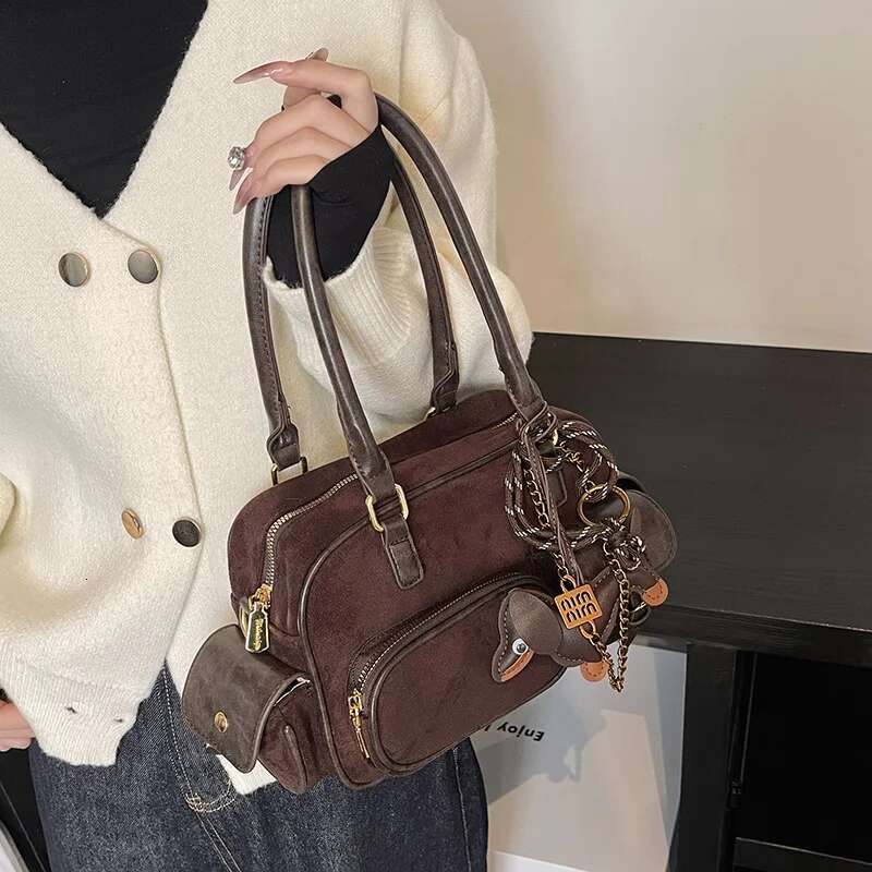 2025 new PU leather and synthetic suede patch designer women's shoulder retro pendant crossbody bag pillow handbag