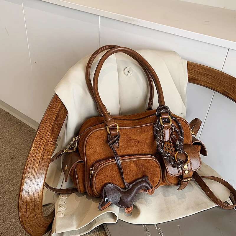 2025 new PU leather and synthetic suede patch designer women's shoulder retro pendant crossbody bag pillow handbag