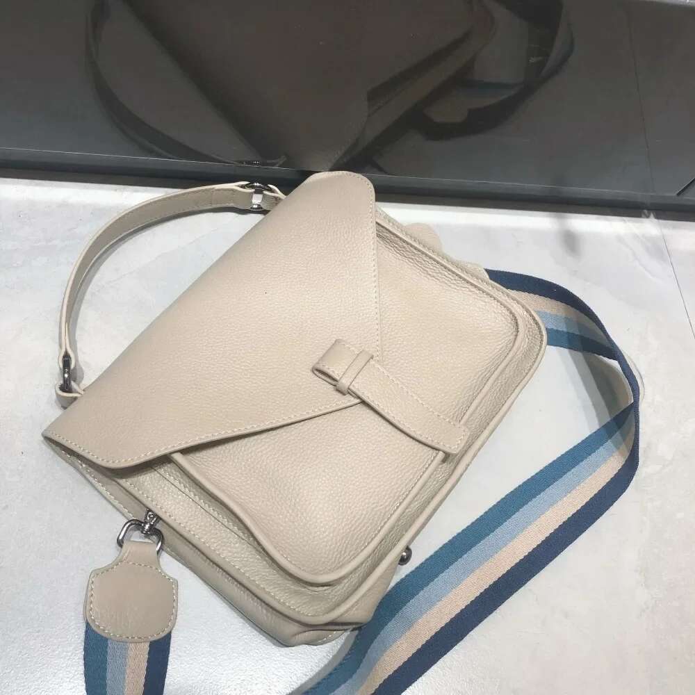 Women's retro temperament first layer cowhide college style simple shoulder crossbody handbag