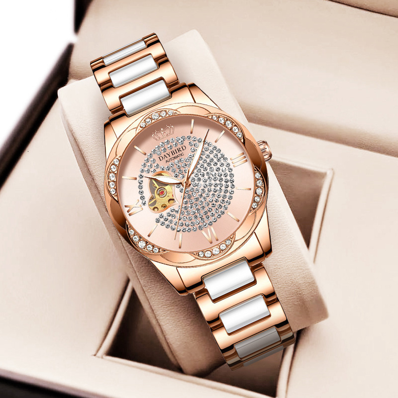 Women's Elegant Ceramic Strap Watch with Starry Sky and Heart Skeleton Design