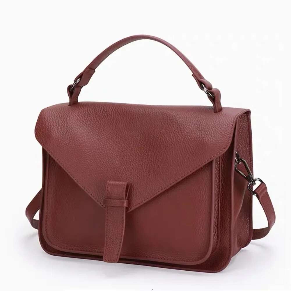 Women's retro temperament first layer cowhide college style simple shoulder crossbody handbag