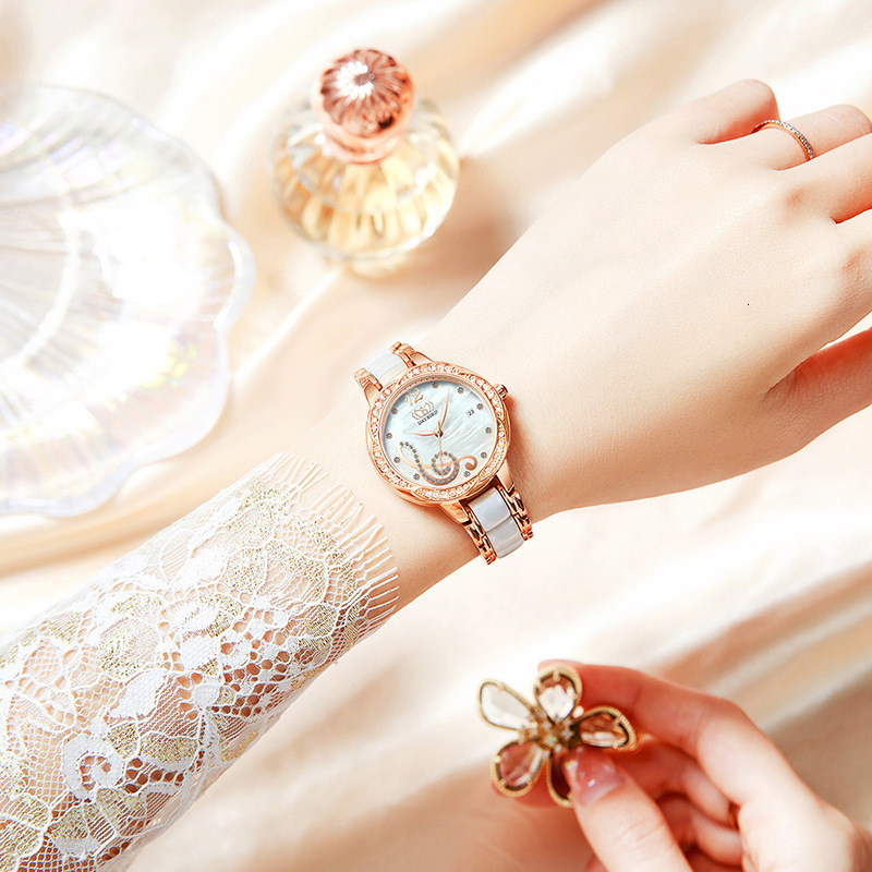 Stylish Women's Watch with Automatic Movement, Musical Notes, and Date Display