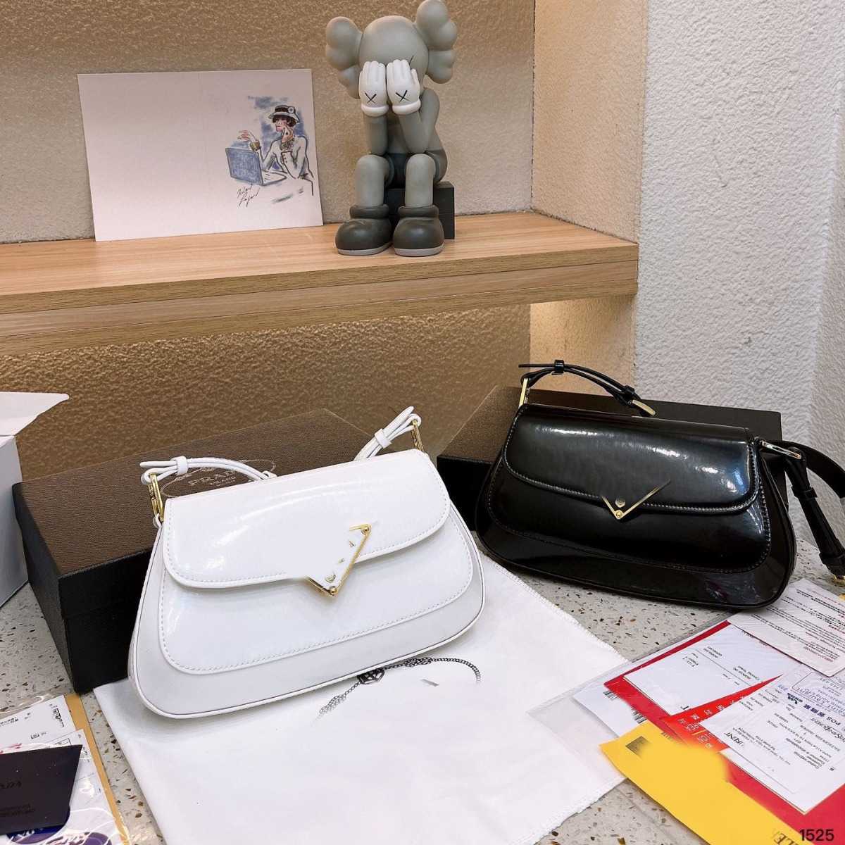 Top Luxury purse Autumn and Winter New Triangle Home Cowhide Enamel Stick Underarm Handheld One Shoulder Crossbody Designer Bag