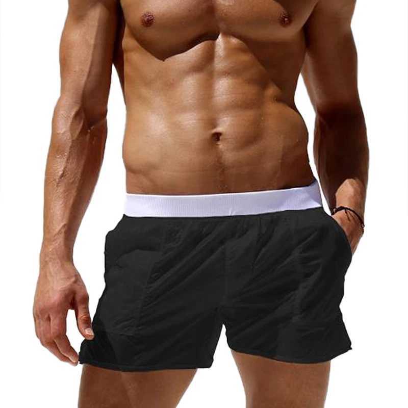 Mens solid swim trunks with elastic waist see through summer quick drying beach shorts low waist swimsuit with pockets W250114