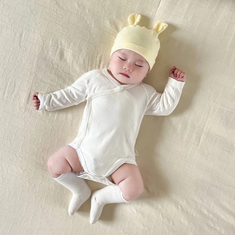 Spring and autumn born baby cotton jumpsuit long sleeved baby boy triangle crawler clothing 0-1 year old girl solid tight fitting clothing 250110