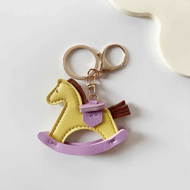 Keychains Lanyards Leather bag pendant rocking horse dragon fashion hanging decoration keychain DIY accessories H250115