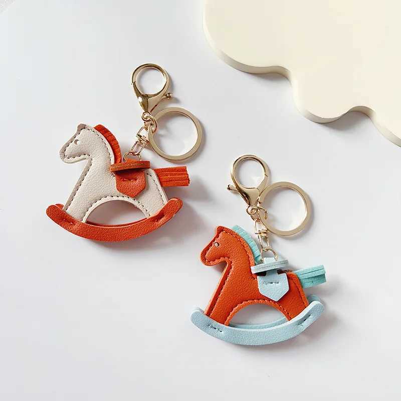 Keychains Lanyards Leather bag pendant rocking horse dragon fashion hanging decoration keychain DIY accessories H250115