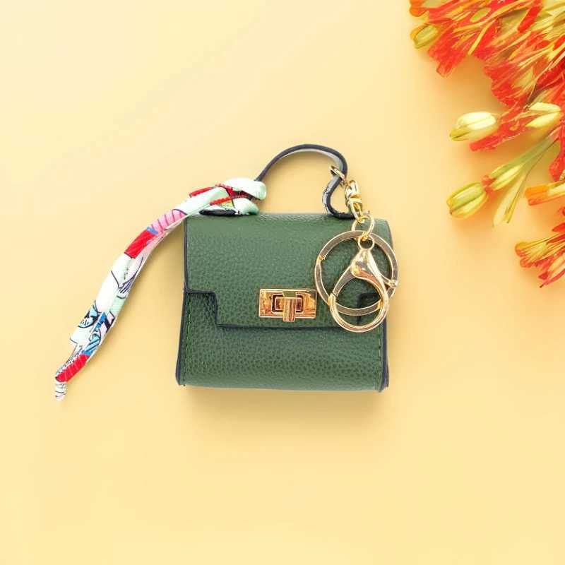 Keychains Lanyards New Mini Bag Pendant Cute Bluetooth Earphone High End Leather Creative Keychain H250115