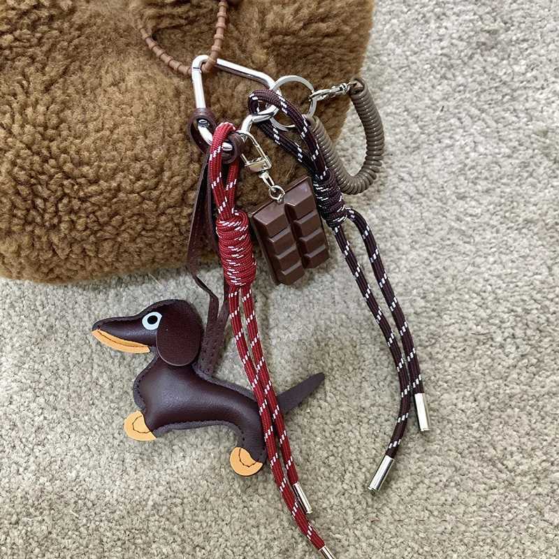 Keychains Lanyards New Vintage Braided Rope Bag Pendant High-grade Creative Keychain Maillard Color Cute Sausage Dog Accessories H250115
