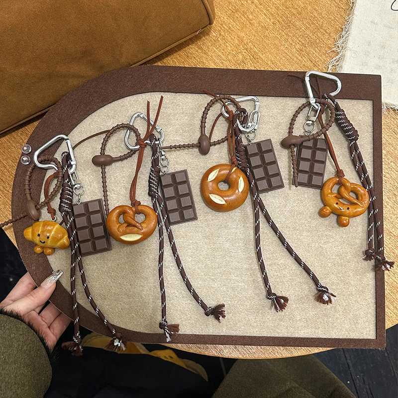 Keychains Lanyards Lovely Exquisite Braided Rope Alkali Bread Bag Hang Chocolate Spring Buckle Pendant Senior Sense H250115