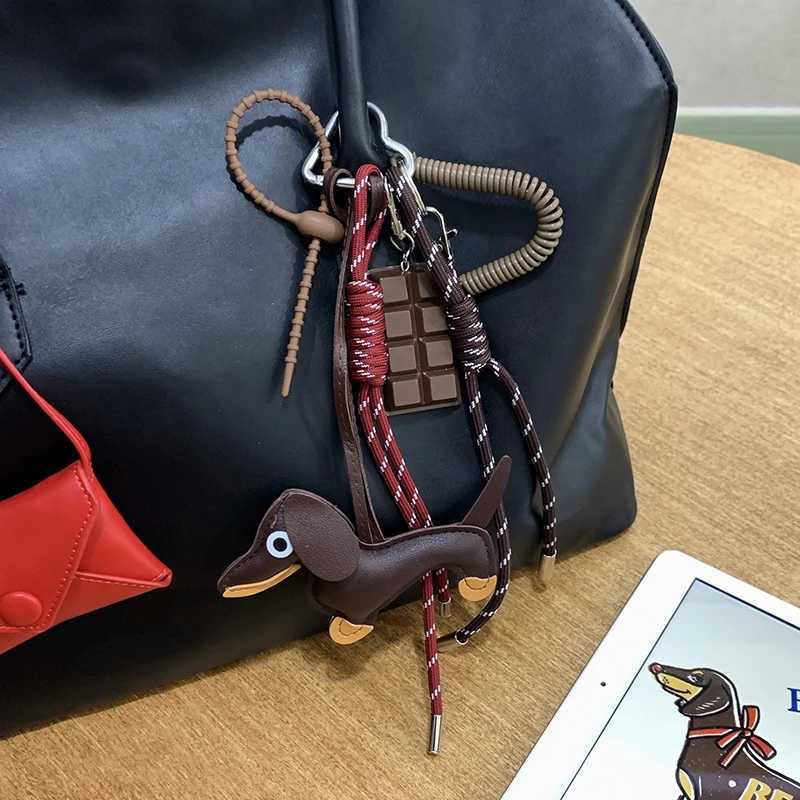 Keychains Lanyards New Vintage Braided Rope Bag Pendant High-grade Creative Keychain Maillard Color Cute Sausage Dog Accessories H250115