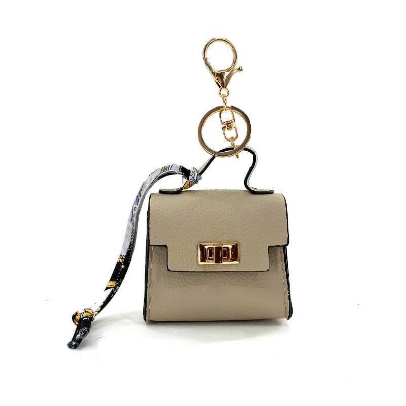 Keychains Lanyards New Mini Bag Pendant Cute Bluetooth Earphone High End Leather Creative Keychain H250115