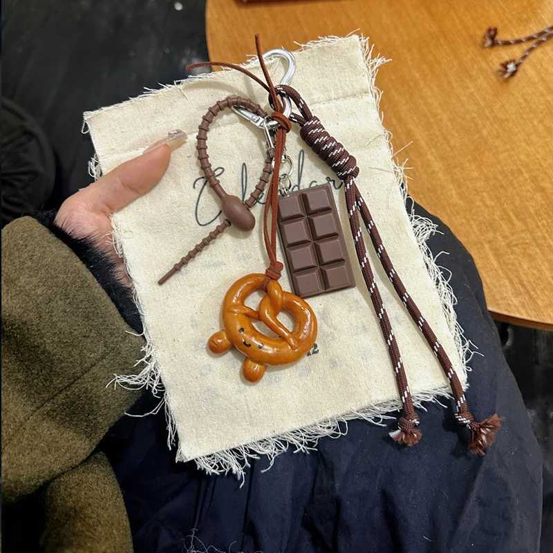 Keychains Lanyards Lovely Exquisite Braided Rope Alkali Bread Bag Hang Chocolate Spring Buckle Pendant Senior Sense H250115