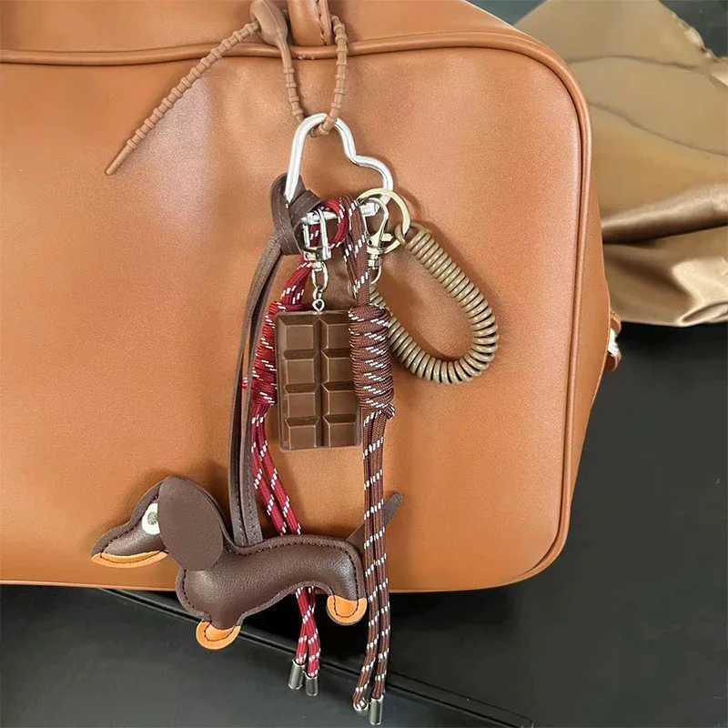 Keychains Lanyards New Vintage Braided Rope Bag Pendant High-grade Creative Keychain Maillard Color Cute Sausage Dog Accessories H250115