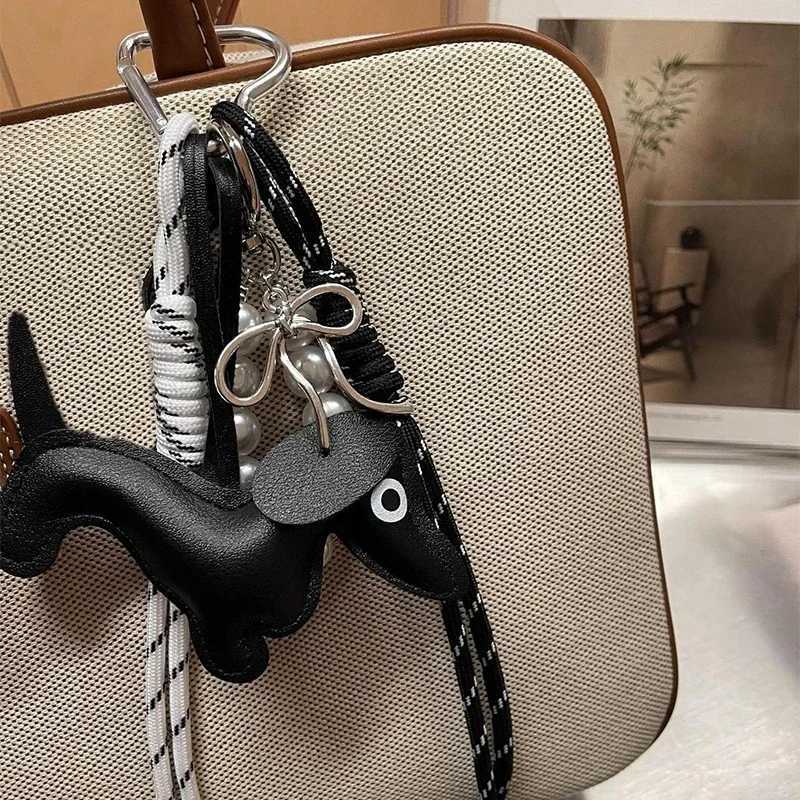 Keychains Lanyards New Vintage Braided Rope Bag Pendant High-grade Creative Keychain Maillard Color Cute Sausage Dog Accessories H250115