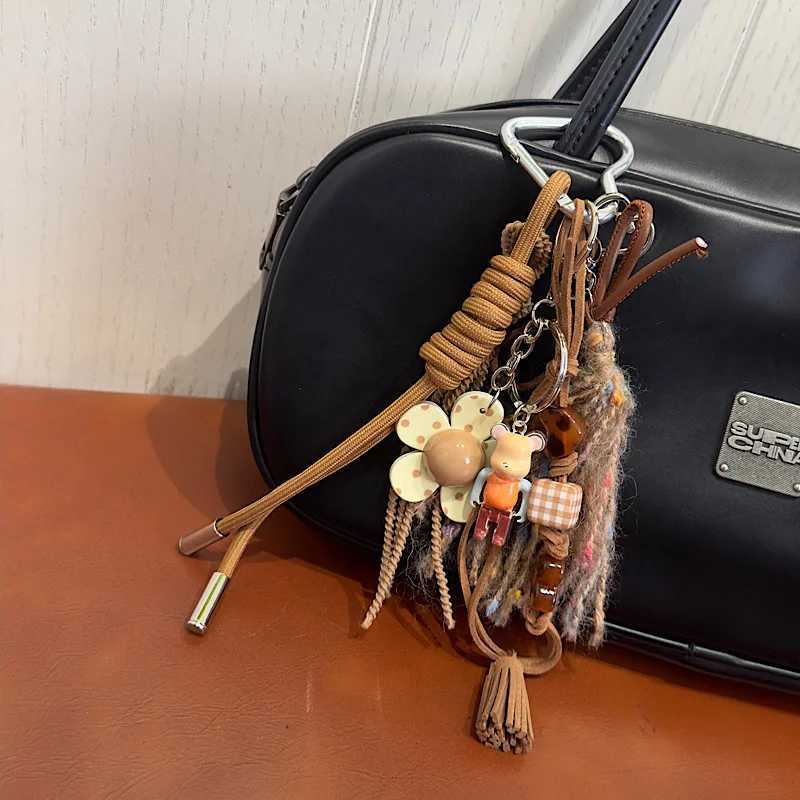 Keychains Lanyards Cell Phone Straps Charms Niche design feels like Maillard tassel pendant personalized and creative phone key bag chain H250217