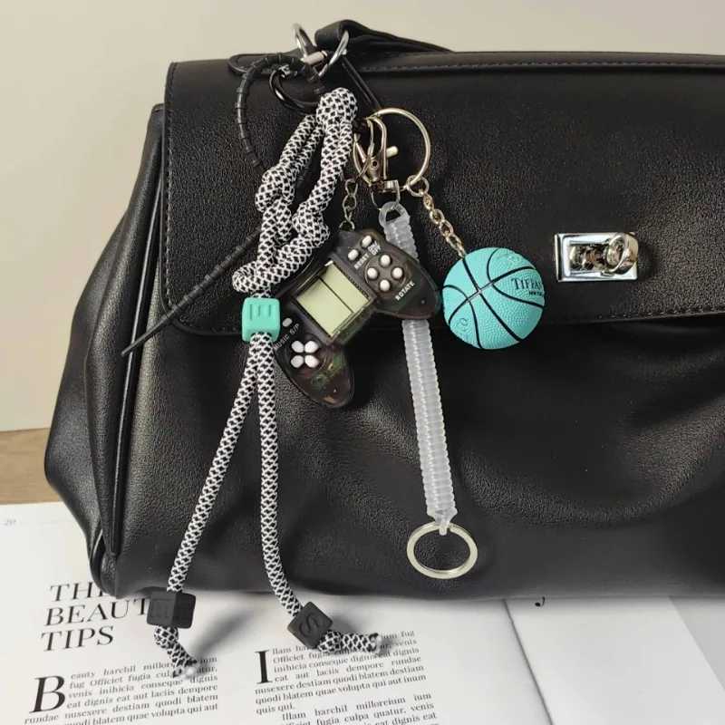 Keychains Lanyards Cute Football Helmet Keychain Yellow Lucky Money Bag Chips Dice Pendant Versatile Trendy Lanyard Game Machine Braided Rope H250115